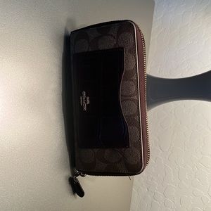 2 Coach purses, 1 wristlet 1 wallet.  Will sale individually or bundle